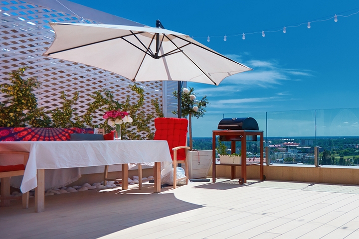 Add some shade with a balcony umbrella