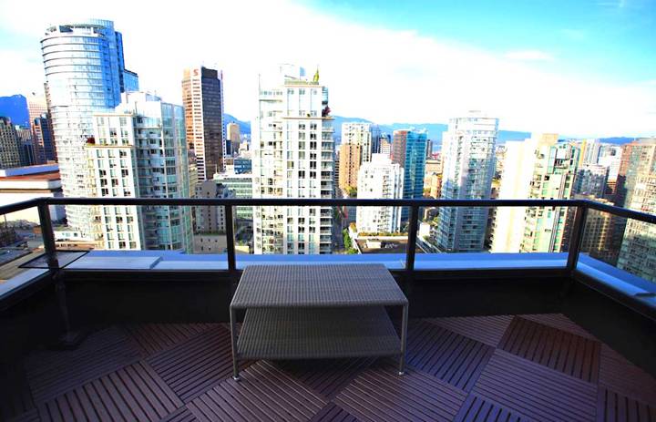 Flooring tiles are great cozy balcony ideas for your condo.